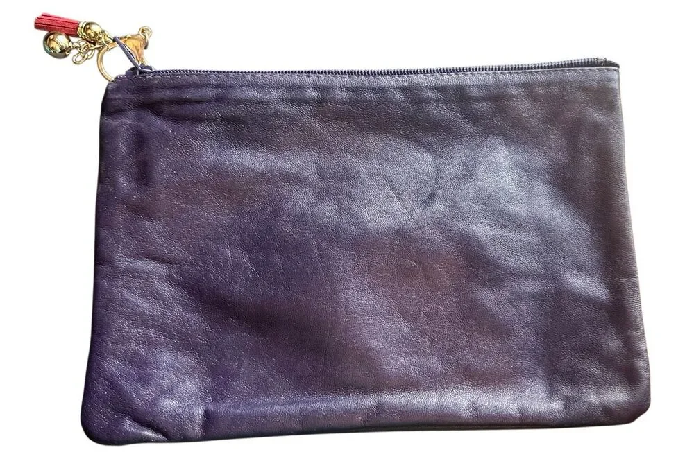Purple leather envelope clutch with pink tassel zipper
